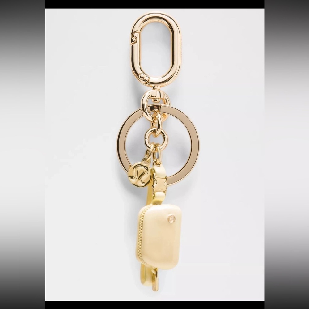 Lululemon Athletica Gold and Cream Key Holder